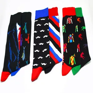 Detailed view of colorful mismatched cotton socks with unique suit and mustache patterns