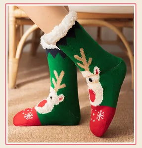 Close-up of cozy Christmas floor socks with warm fleece lining and reindeer pattern