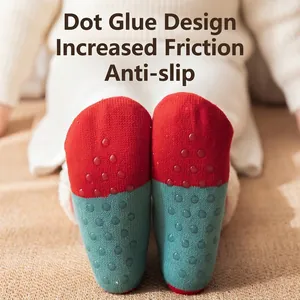 Winter non-slip Christmas fleece floor socks with textured grip soles in festive red and green