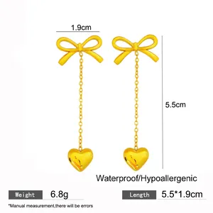 Elegant gold-plated bow and heart tassel earrings with dimensions and weight info.