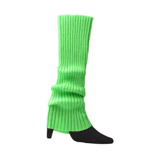 Detailed macro view of neon green knitted leg warmers with ribbed texture