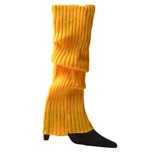 Vibrant neon yellow knitted leg warmers for ballet and dance styling details