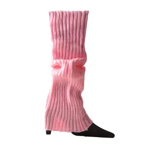 Close-up of neon pink ribbed knitted leg warmers for ballet or dance