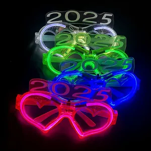Close-up of stacked colorful LED neon heart glasses with 2025 design for New Year party.