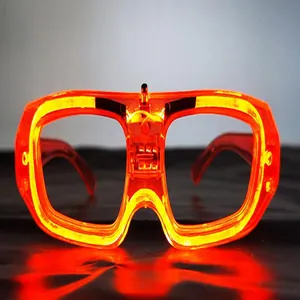 Close-up of glowing orange LED party glasses with vibrant cold light square frames