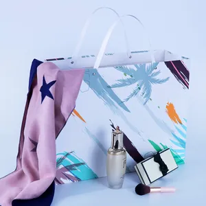 Stylish rivet paper gift bag with tropical palm tree print and white ribbon handles