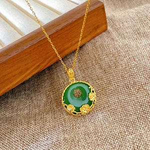 Close-up of a new Chinese style green circular pendant with delicate golden roses