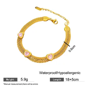 Detailed view of gold mesh stainless steel bracelet with pink heart stones and measurements.
