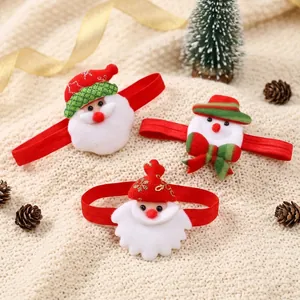 Christmas themed elastic headbands with Santa Claus and Snowman cartoon characters