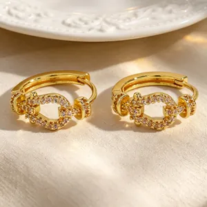 Close-up of vintage gold hoop earrings with sparkling micro-pave zircons