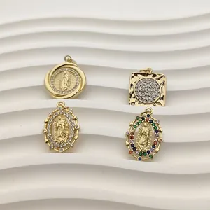 Set of four religious gold Virgin Guadalupe and Saint Benedict medals with zircon inlays
