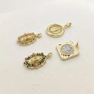 Detailed macro view of exquisite Guadalupe pendants with colorful micro-set zircons