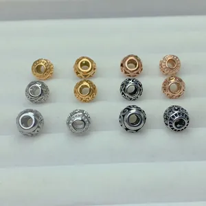Vintage stainless steel filigree large hole spacer beads in assorted colors for DIY jewelry.