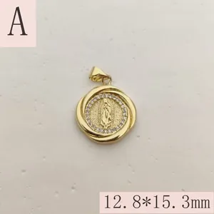 Detailed macro shot of a gold Our Lady of Guadalupe pendant with CZ micro pave