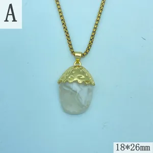 Close-up of retro resin pendant necklace with textured gold cap and 18x26mm size dimensions.