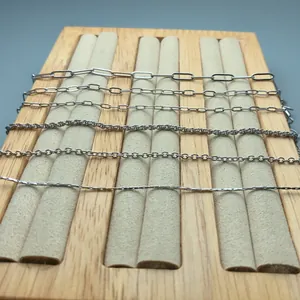 Detailed view of various silver stainless steel chain link styles for DIY jewelry