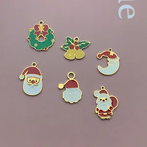 Selection of colorful enamel Christmas charms for DIY necklace and bracelet making