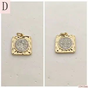 Detail of two-tone square Saint Benedict medal pendant measuring 15x15mm.