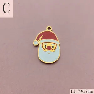 Close-up of Santa Claus enamel charm with 11.7x17mm dimensions for jewelry making.