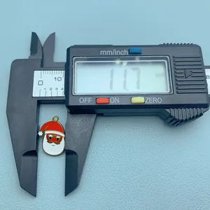 Detailed view of 11.7mm Christmas Santa Claus pendant with digital caliper scale