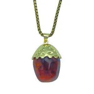 Vintage acorn pendant necklace with amber resin and gold plated copper chain for women