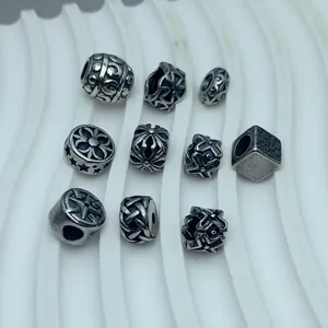 Macro view of assorted gothic stainless steel spacer beads for DIY jewelry making crafts