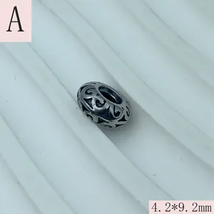 Detailed macro shot of vintage silver filigree spacer bead, size 4.2x9.2mm for DIY jewelry