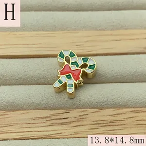 Macro detail of enamel Christmas candy cane charm with 13.8x14.8mm dimensions for DIY