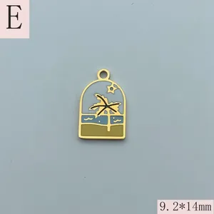 Detailed macro view of stainless steel enamel pendant with palm tree beach design