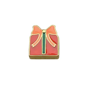 Red Christmas gift box enamel charm bead for DIY jewelry making with gold edges.