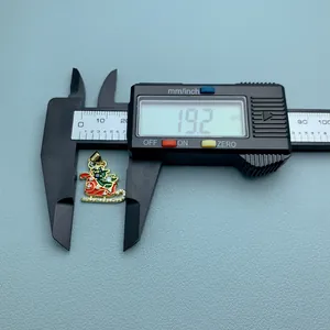 Christmas sleigh pendant measurement showing 19.2mm size with digital caliper.
