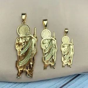 Detailed view of three Saint Jude gold-plated pendants featuring green zirconia stones.