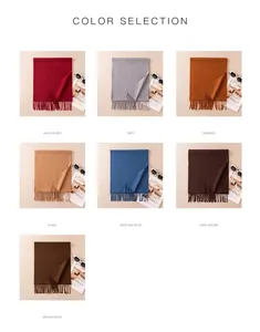 Selection of solid color wool scarves with tassels in multiple autumn colors