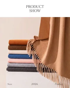 Macro view of soft wool blend scarf tassels in various autumn colors
