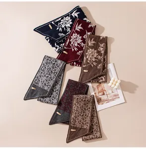 Elegant collection of jacquard knit scarves with floral patterns in diverse winter colors