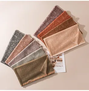 Premium cashmere shawls with jacquard thistle patterns in a variety of elegant earthy colors