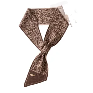 Elegant jacquard cashmere knit scarf with a stylish pull-through tie design in brown
