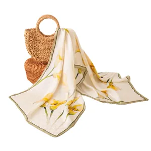 Elegant mulberry silk scarf with yellow lily floral print and olive green border trim
