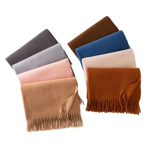 Elegant long wool scarves in assorted solid colors with stylish fringe tassels