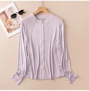 Detail of a lilac slim-fit sun protection jacket with a stand collar and zipper.