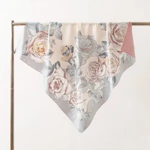 Elegantly draped 16mm mulberry silk twill scarf with sophisticated rose floral pattern