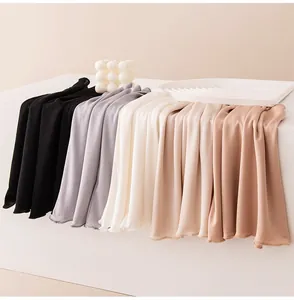 Variety of soft and breathable silk sun protection neck gaiters in neutral tones.