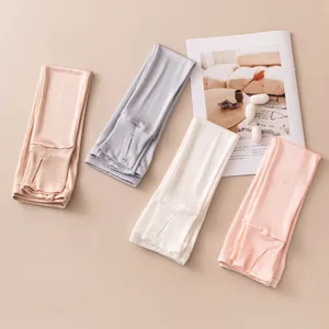 Set of four mulberry silk sun protection arm sleeves in elegant pastel shades for women