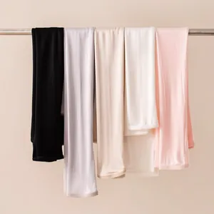 Detail view of multi-color long mulberry silk sun protection sleeves with lace trim