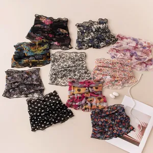 Collection of various floral and polka dot silk mesh neck gaiters for sun protection