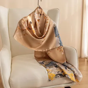 Detail showing the premium texture and Chinese ink landscape on 100% silk scarf.
