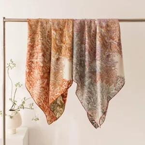 Premium mulberry silk double-sided printed square scarf featuring elegant botanical floral patterns
