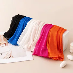 Macro view of colorful breathable mesh sun protection neck gaiters in various shades