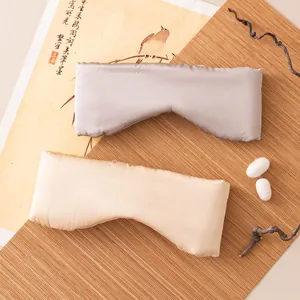 Premium mulberry silk sleep eye masks in grey and champagne with luxury silk cocoons