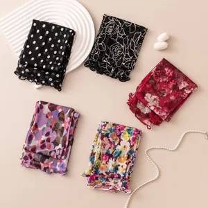 Assorted floral and polka dot patterns of thin mulberry silk sun protection arm sleeves